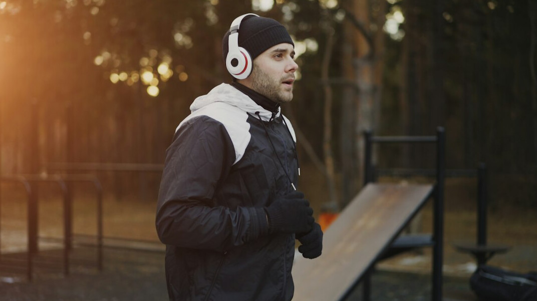 person jogging in forest