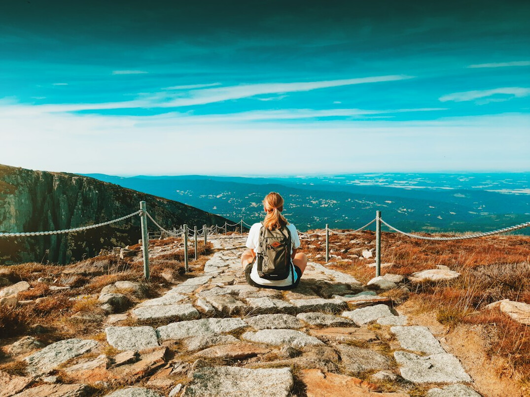 person meditating in nature