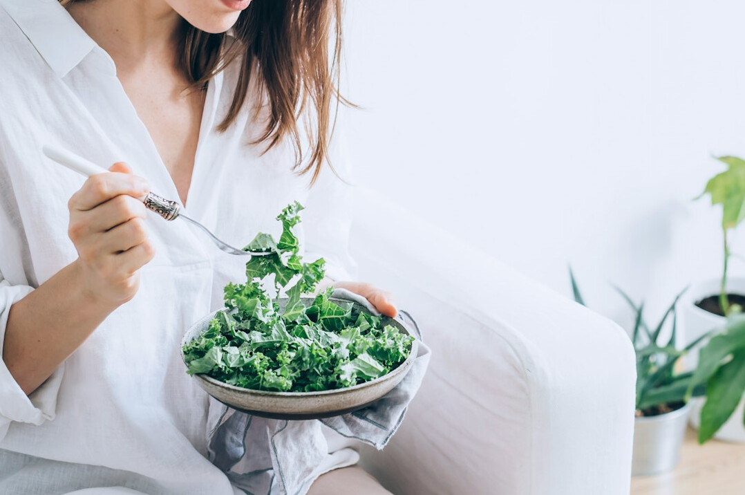 woman eating healthy salad